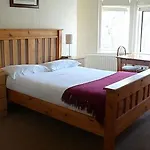 Ashling House Serviced 게스트하우스 3*